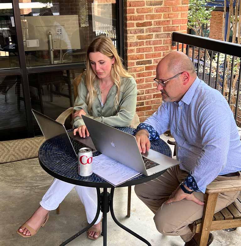 A balcony meeting at Redroc HQ.