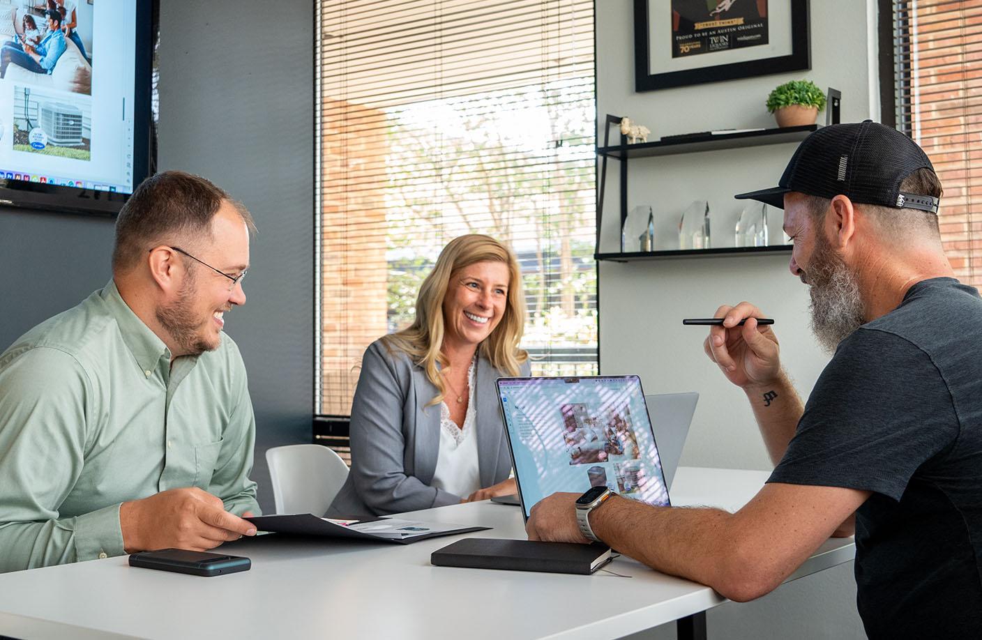 A design meeting at Redroc Austin Ad Agency