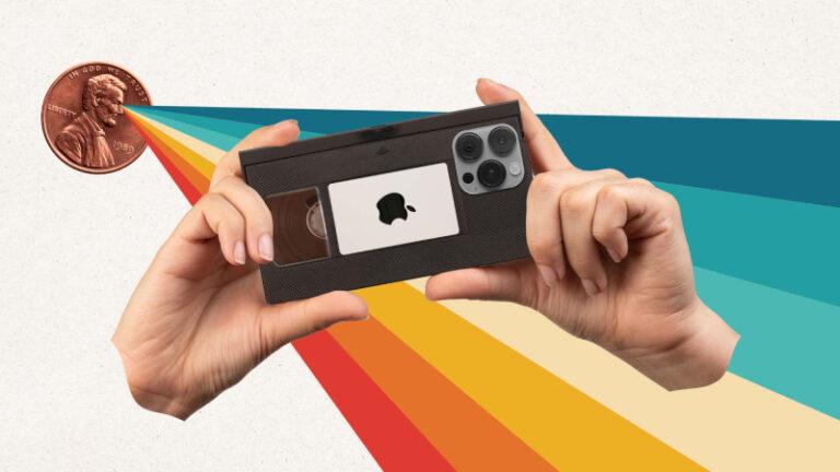 a person holding an old school video game